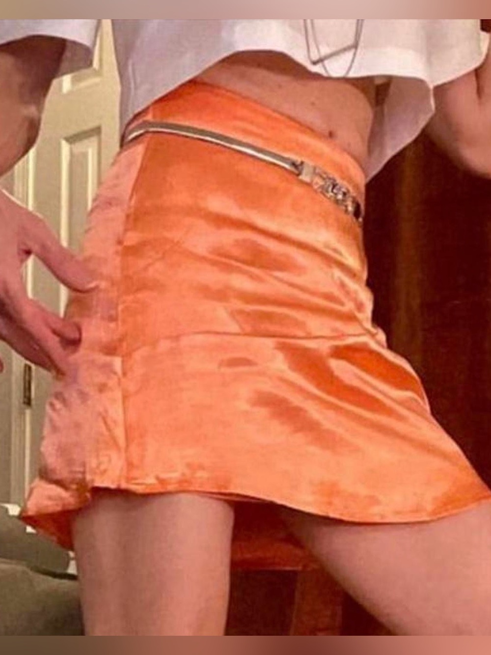 Orange satin mini skirt